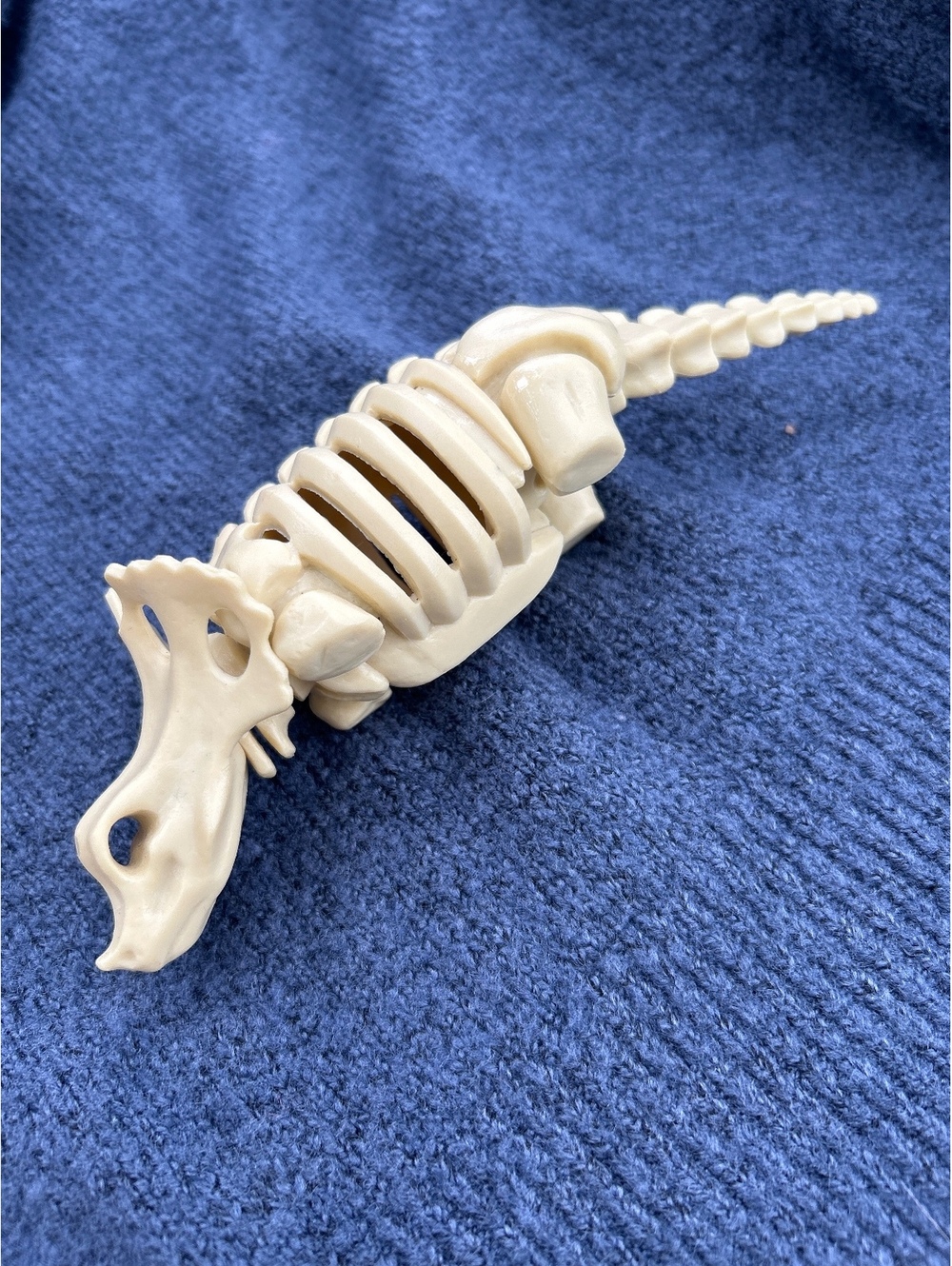 Toy dinosaur bone part